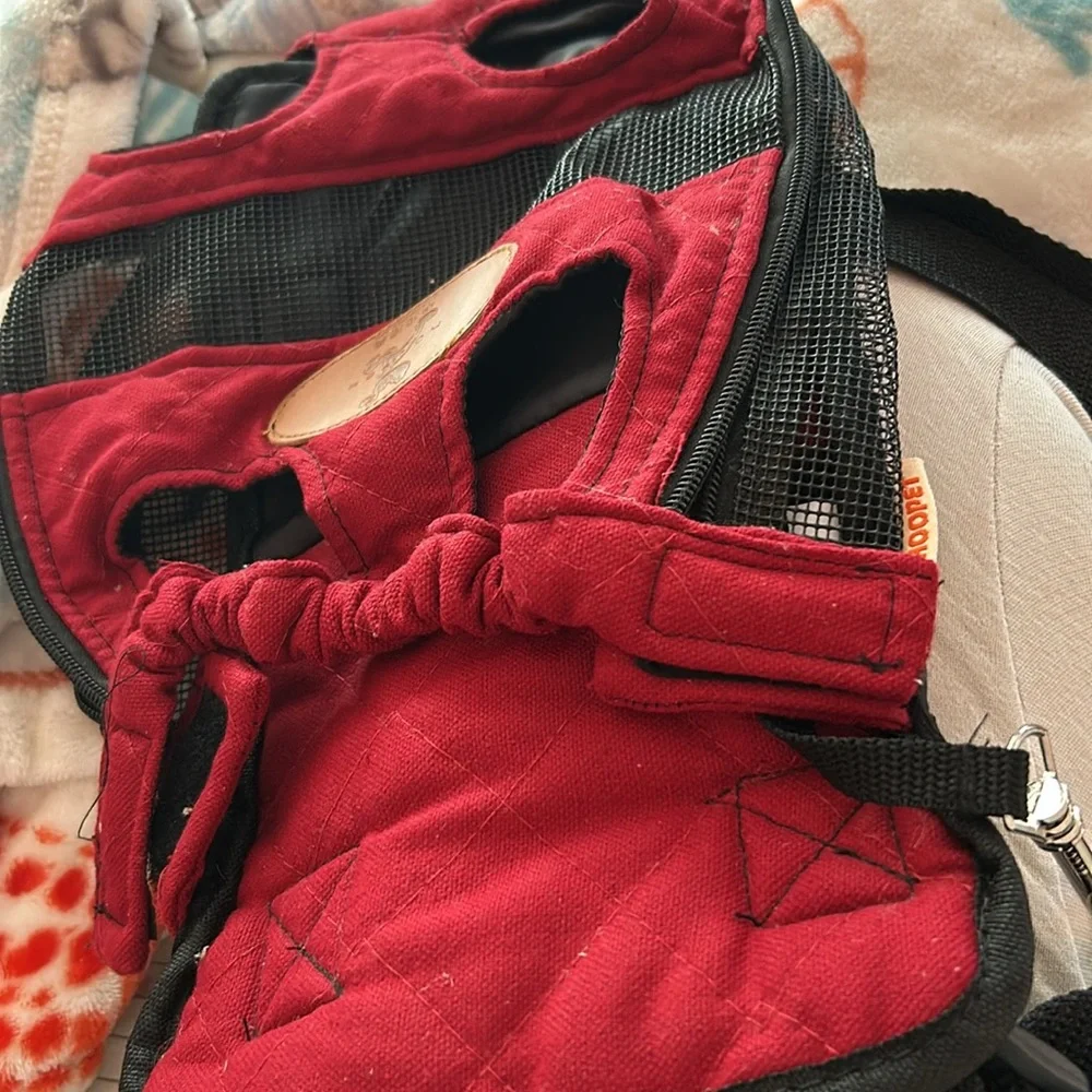 My dog has outgrown this little doggy backpack, but it’s very beautiful.